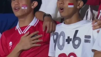90+699: Kode Misterius Suporter Indonesia di Qingdao
